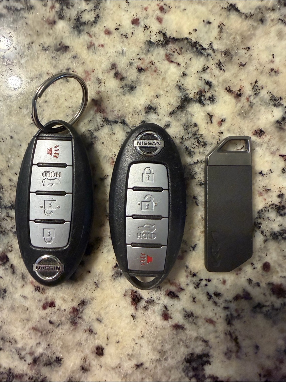 Set of Nissan Smart Keys Fob Set in Black and Silver
